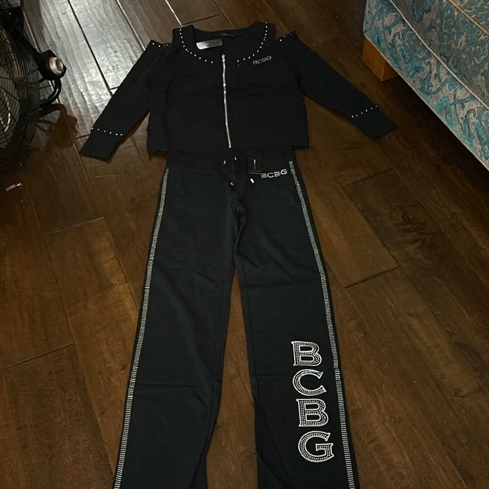 BCBG jogger- studded pants and jacket with cutout shoulder